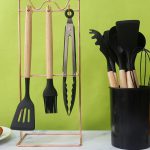 kitchen utensils set including spatula, ladle, spoon, tongs, whisk and holder basket safe for nonstick cookware