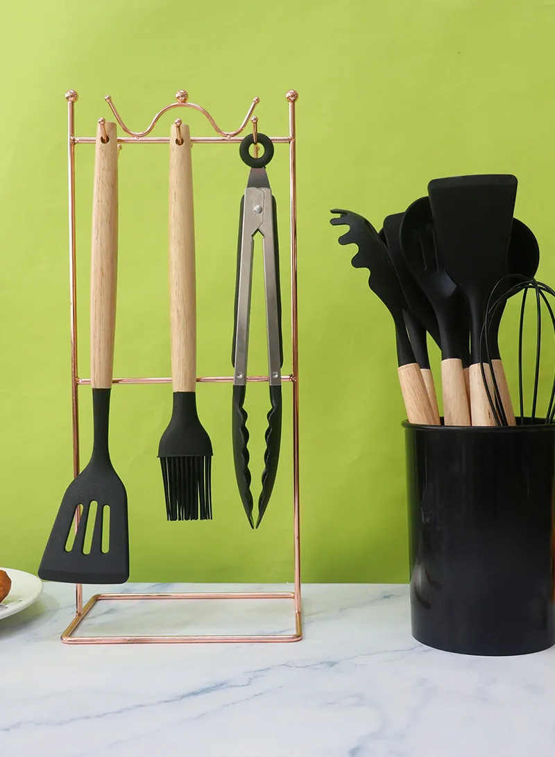 kitchen utensils set including spatula, ladle, spoon, tongs, whisk and holder basket safe for nonstick cookware