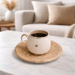 coffee cups with luxury gold ring and matching plates arranged for elegant coffee serving