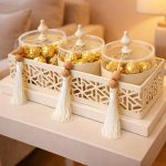 decorative Ramadan plexi jars set with metal tray featuring 3 jars filled with wrapped chocolates, elegant serving and countertop décor from Homedash Lebanon