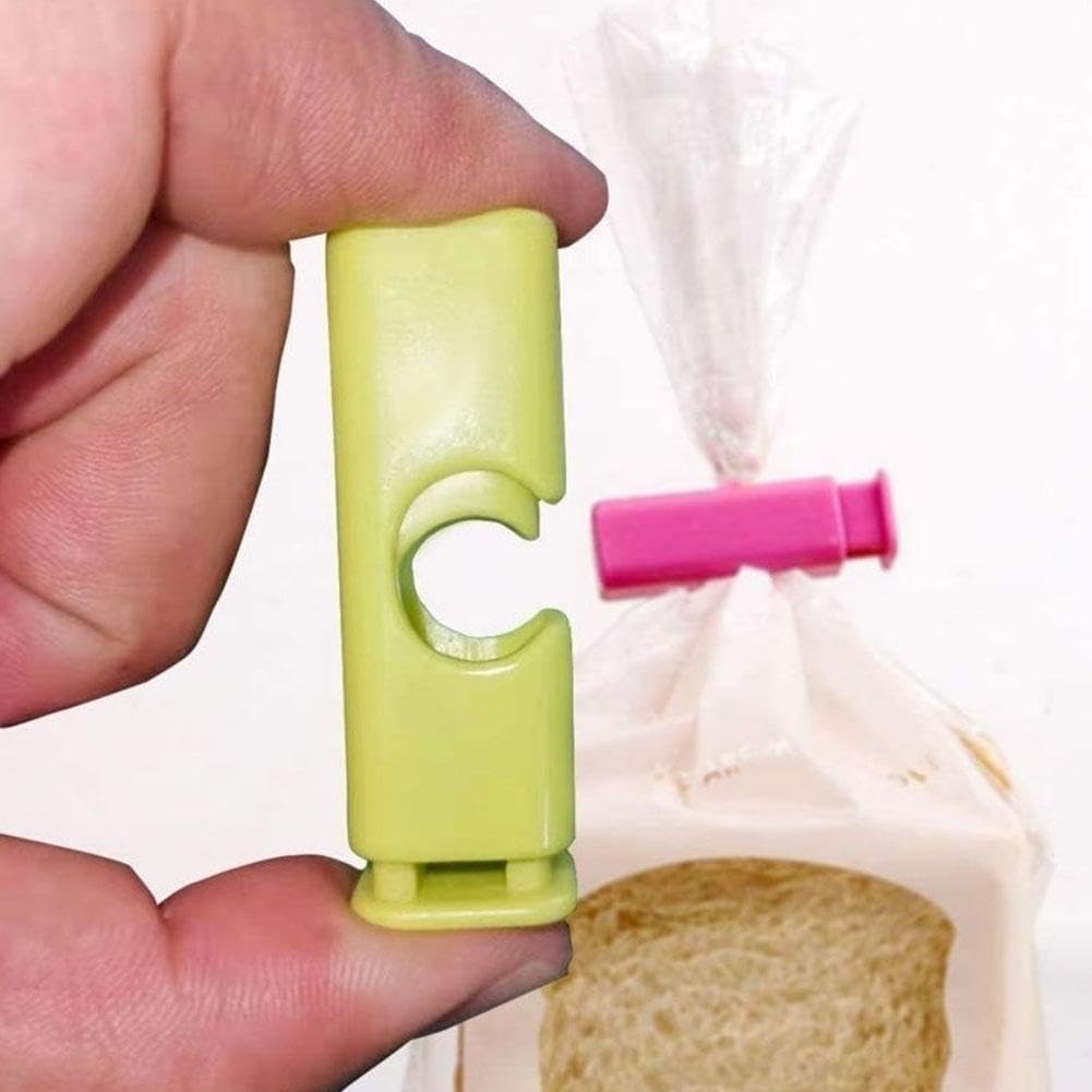 Set of 4 reusable plastic bag clips for sealing bread and snack bags, squeeze and lock moisture-proof food storage clips – shop now from Homedash in Lebanon.
