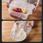 Transparent elastic plastic bowl cover stretched over fruit bowl and frying pan, reusable large food storage cover 60 to 100 cm