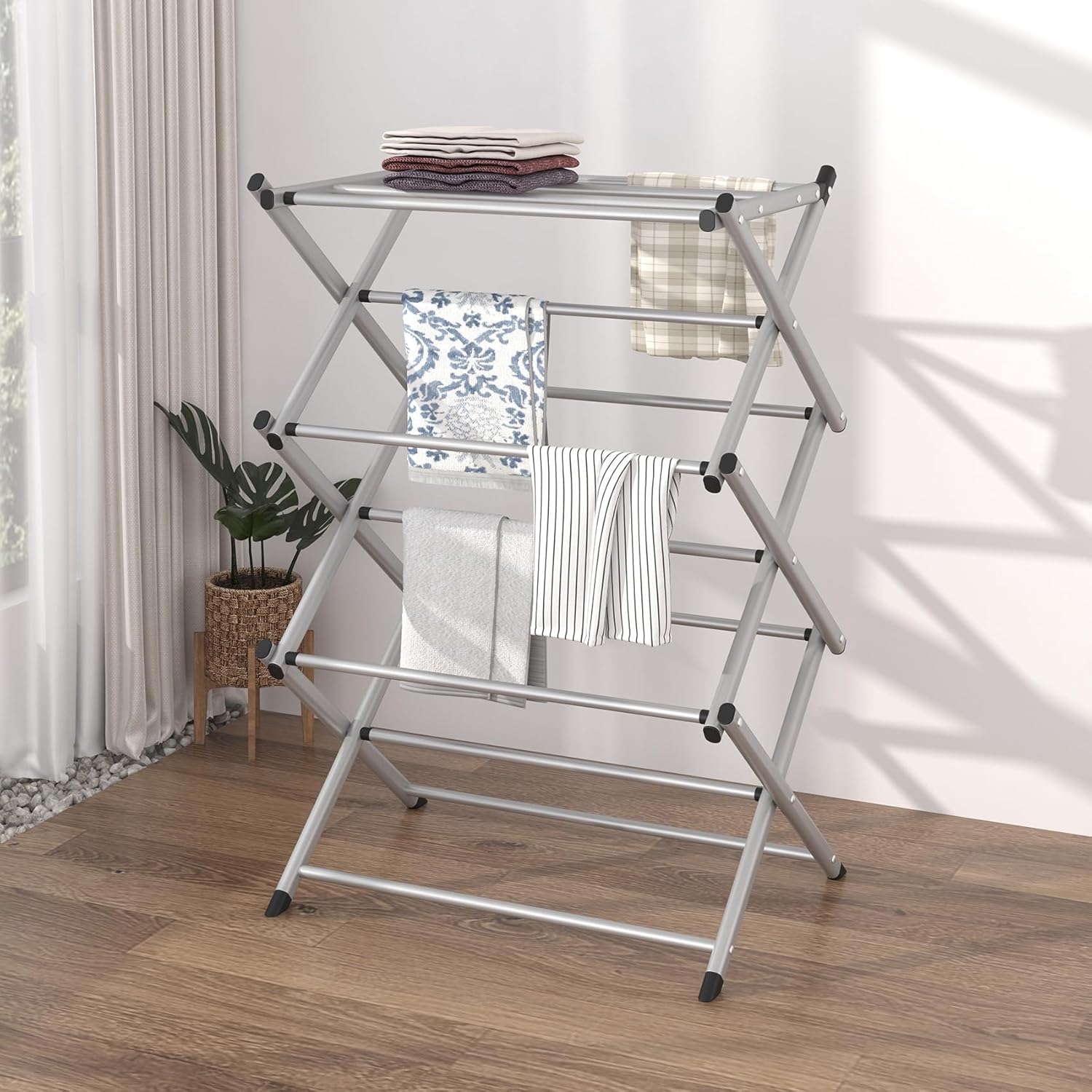 foldable clothes drying rack with accordion design for air drying laundry indoors