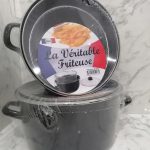 coated deep fryer pot with stainless steel base, glass lid, and frying basket suitable for gas, electric, and induction cooktops