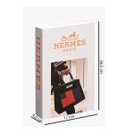 faux decorative book set used for coffee table and shelf styling with modern home decor accessories.