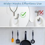 Set of 2 transparent adhesive wall hooks with stainless steel hooks holding a sponge and towel on a white background – strong removable wall hooks for kitchen and bathroom.
