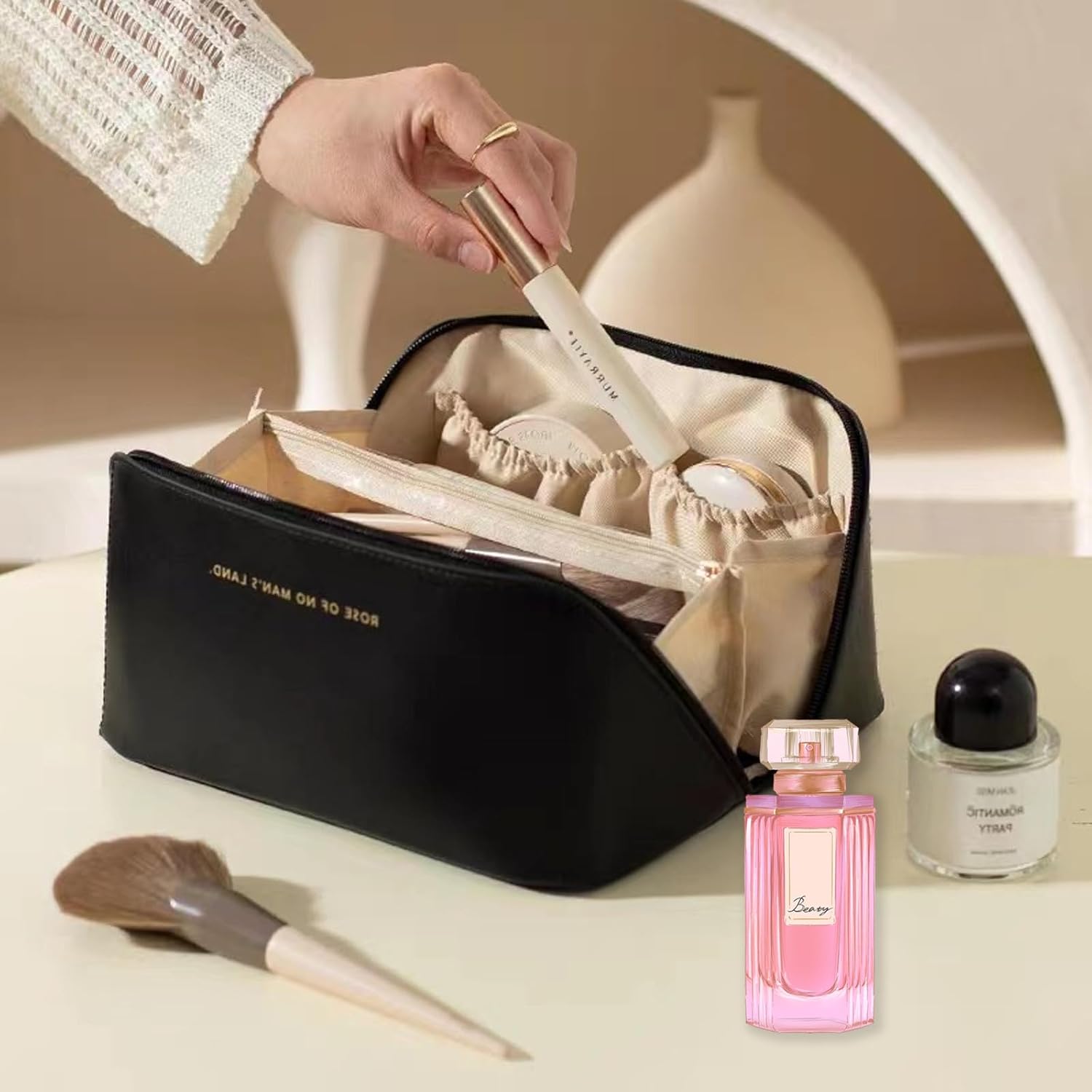 cosmetic bag made of waterproof PU leather with multi-layer compartments and wide opening for travel and daily use.