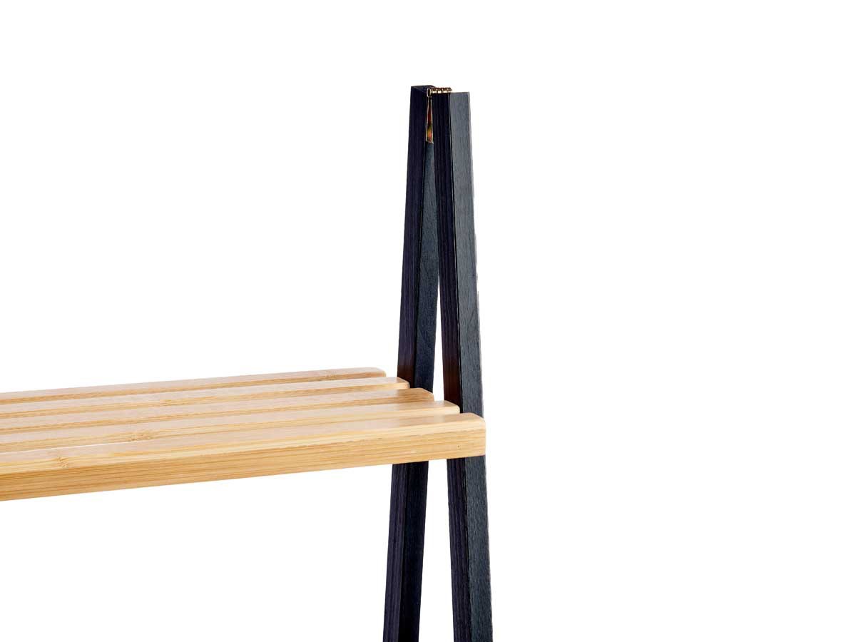 4 tier wooden organizer ladder shelf with natural wood shelves and black legs used for plant display and home storage