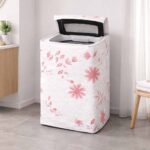 Floral EVA washing machine cover with top zipper for 9 to 11kg top load washer in modern bathroom