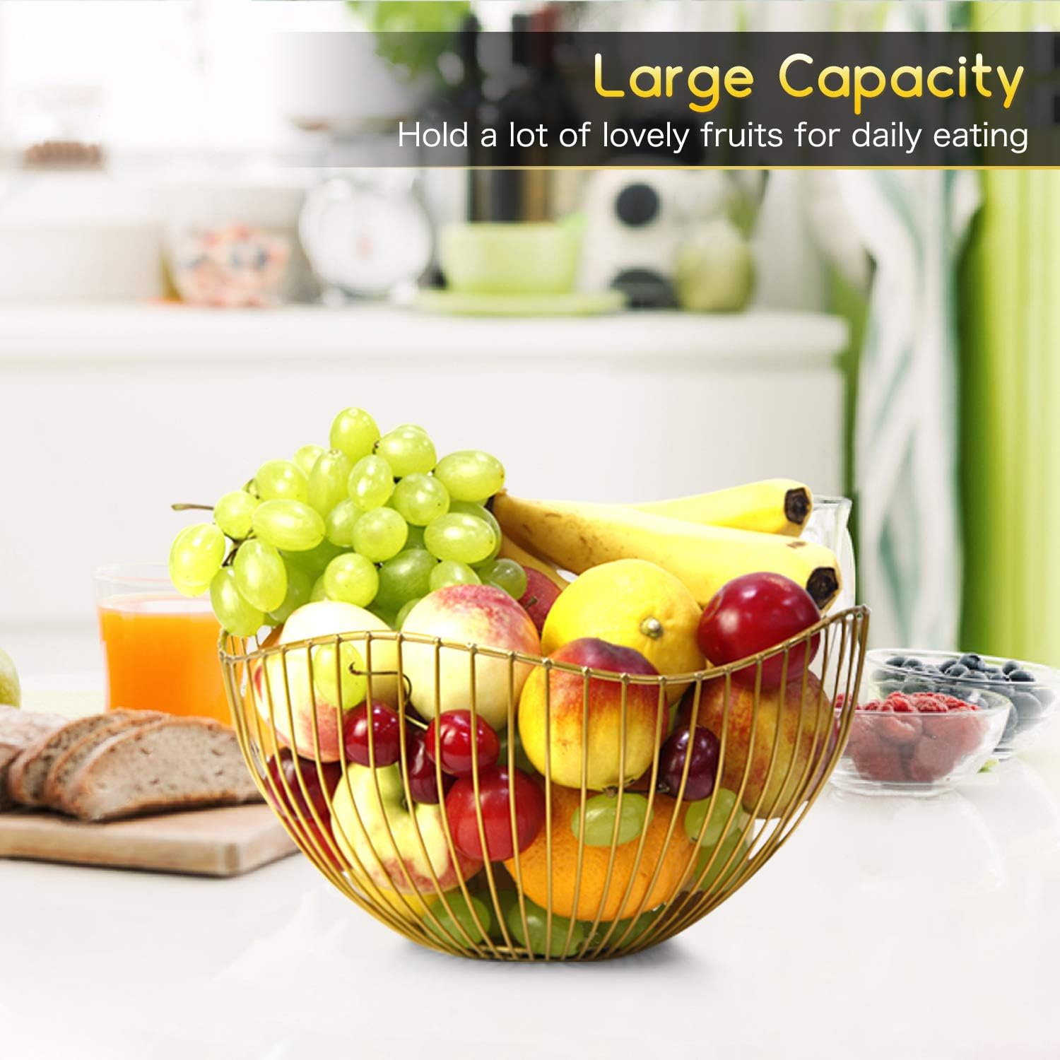 Wide metal fruit basket with gold holding apples and bananas