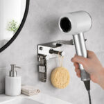 Wall mounted stainless steel hair dryer holder with hooks for bathroom organization