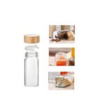 360-degree rotating bamboo spice rack with 16 airtight glass spice jars and shaker lids on white background