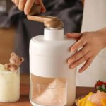 Portable manual ice shaver machine with stainless steel blade for making shaved ice, slushies, smoothies, and desserts in Lebanon.
