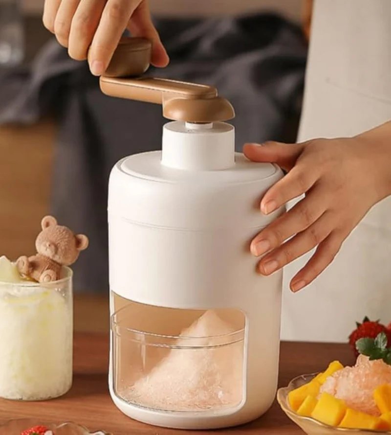 Portable manual ice shaver machine with stainless steel blade for making shaved ice, slushies, smoothies, and desserts in Lebanon.