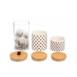 porcelain and glass kitchen canister set with airtight bamboo lids and decorative heart and polka dots designs on white background