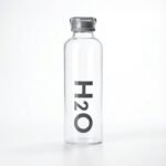 1000ml leak proof H2O decorated glass water bottle with premium reusable design on white background