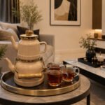 metal tea kettle and teapot set with wood handles