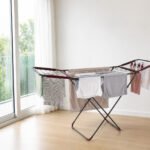 Avrora steel foldable laundry drying rack with rust-resistant coating and side wings in white background
