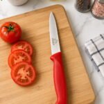 Vanadium 21 cm stainless steel sharp point kitchen knife with ergonomic colored handle for cutting vegetables and meat.