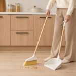 bamboo broom and dustpan set with upright standing storage, rubber-edge dustpan, available in black and light grey.