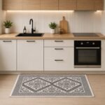 kitchen mat with geometric woven pattern in neutral grey and cream tones measuring 60x100 cm.