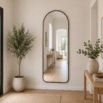 full-length floor mirror with slim metal frame, freestanding stand and wall-mount hooks, size 59x165 cm.