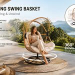 Modern 360° swivel swing basket chair with round base, woven basket frame, and soft cushion for indoor and outdoor relaxation.