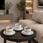 White ceramic tea and coffee cup set with 6 cups and 6 saucers featuring silver leaf pattern and silver-plated handles.