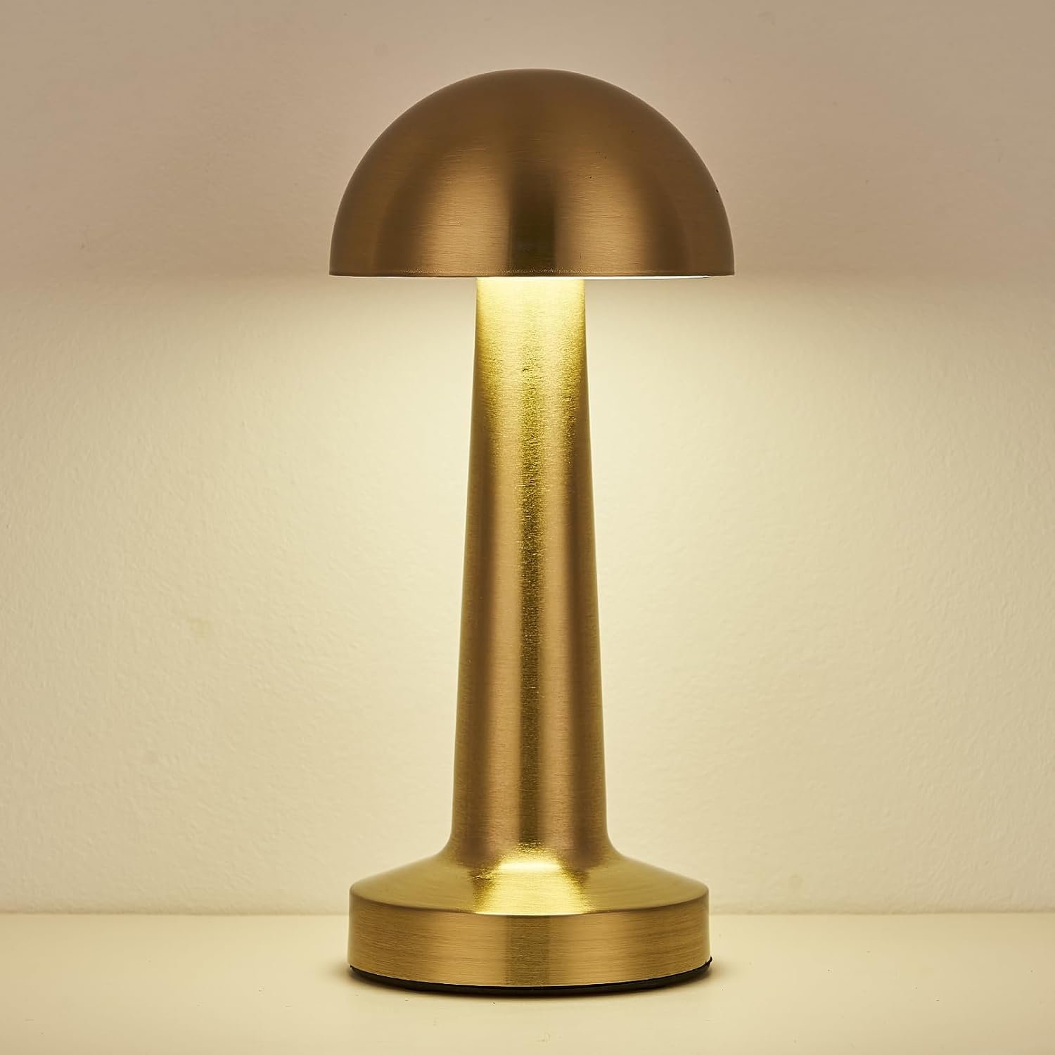 mushroom-shaped rechargeable LED table lamp with touch control and 3 light modes in rose, gold, and silver finishes.