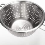 stainless steel long handle kitchen strainer for draining pasta, washing fruits, vegetables, and salads.