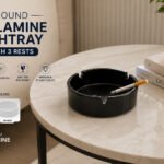 Round melamine ashtray with three cigarette rests,