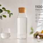 glass bottle with natural cork cap, airtight reusable bottle for water, juice, milk, oils and vinegar.