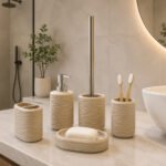 bathroom accessory set with soap dispenser, organizer, tumbler, soap dish, and toilet brush holder.