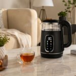 Dosthoff 1.7L electric glass kettle with digital temperature control panel, borosilicate glass body, and matte black finish.