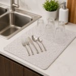 Absorbent microfiber dish drying mat 80 x 40.6 cm available in two designs.