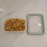 Transparent 2.6L rectangular airtight BPA-free food container with snap-lock sealing lid for fresh food storage.