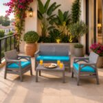 Grey outdoor 4-seater plastic sofa set with blue cushions and matching coffee table for patios, balconies, gardens, and terraces.